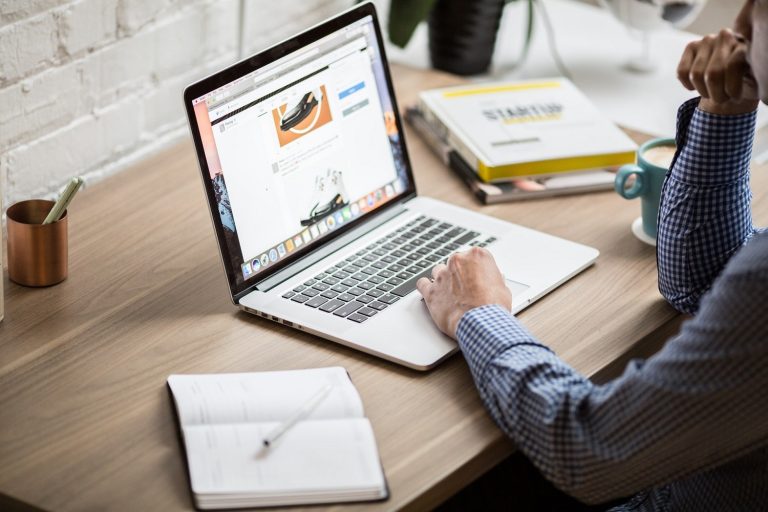 man working on laptop