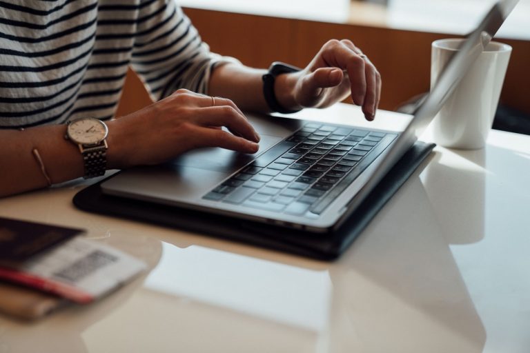 typing on laptop