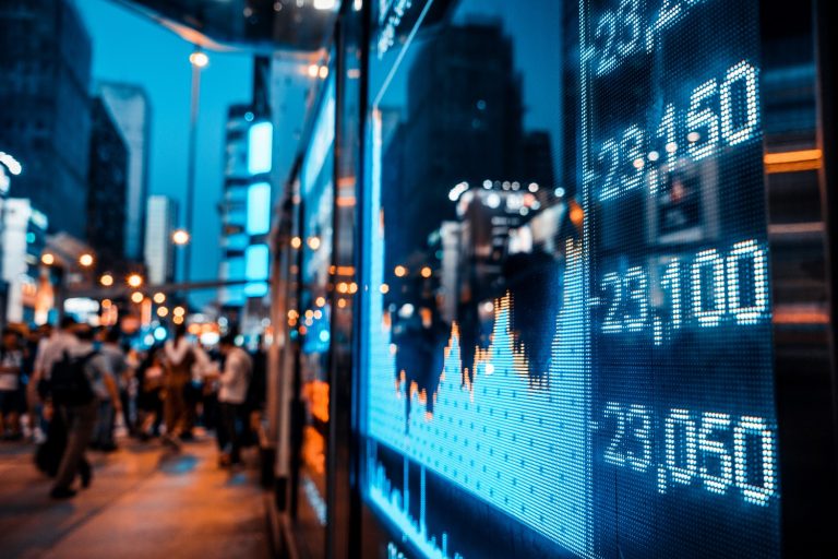 Stock market quotes with city scene